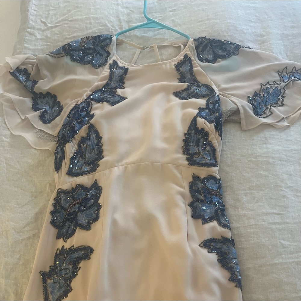 Elegant Light Pink Gown with Blue Floral Embellishments